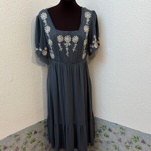 In loom green and white floral embroidered midi dress. Size M.